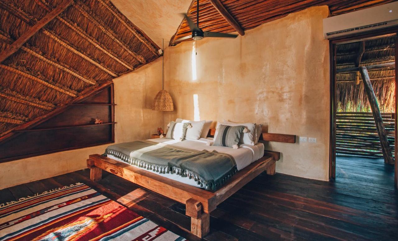 Ikal Tulum Hotel Exterior foto A bedroom at the hotel