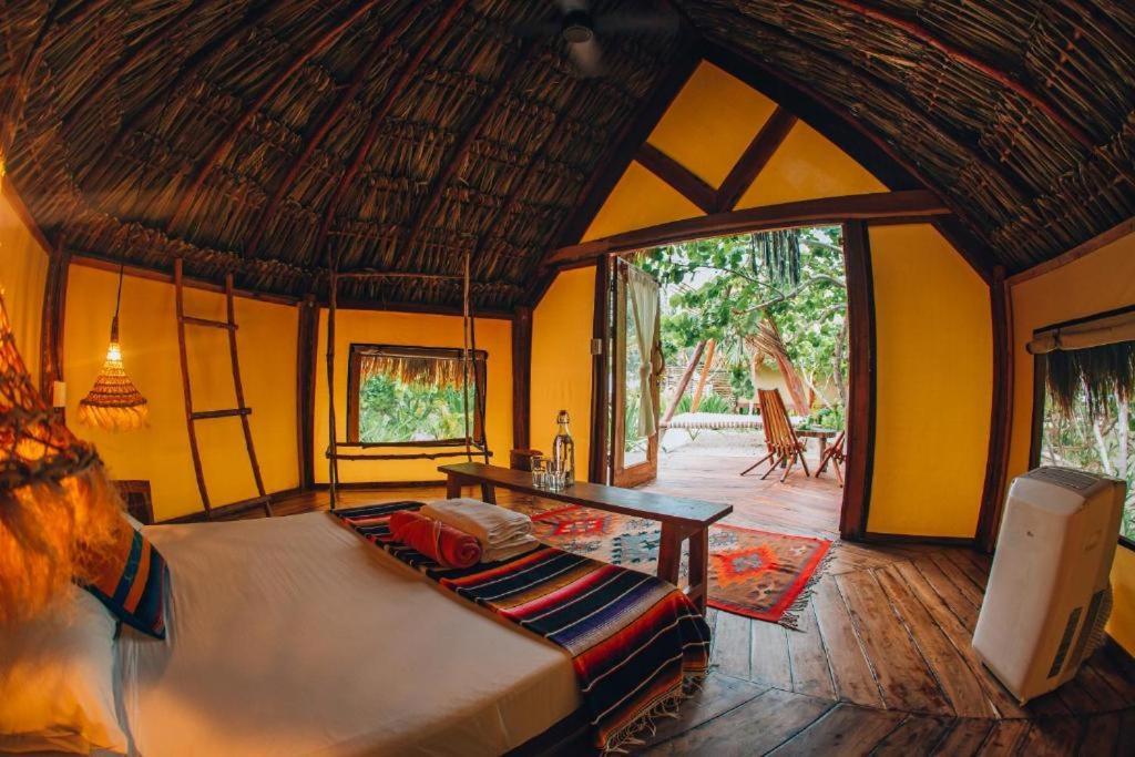 Ikal Tulum Hotel Exterior foto Interior of a bungalow at Xel-Ha